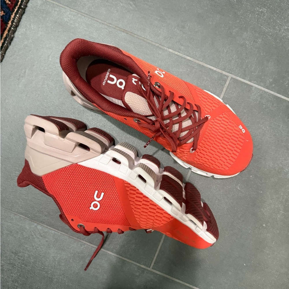On Running orange and maroon Sneakers